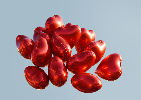 Red heart shape balloons on sky. Valentine’s day gifts red heart shape balloons on sky with clipping path