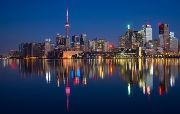 istock Toronto at night with illuminated skyline from across the lake 1835752518