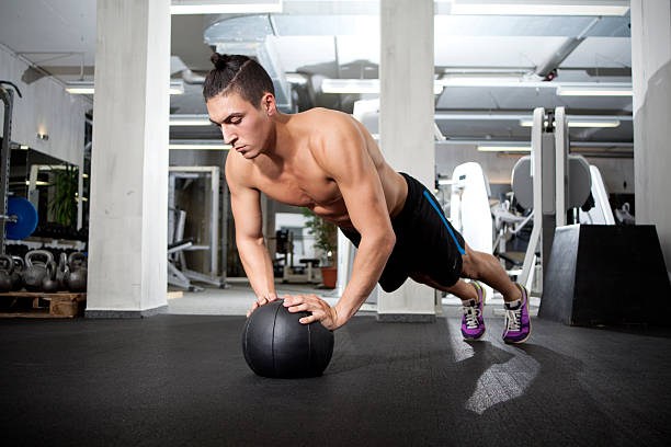 istock Push-up on medicine ball 183577101