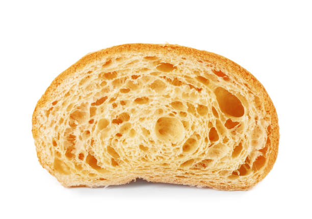 istock Delicious cut croissant isolated on white. Fresh pastry 1835772433