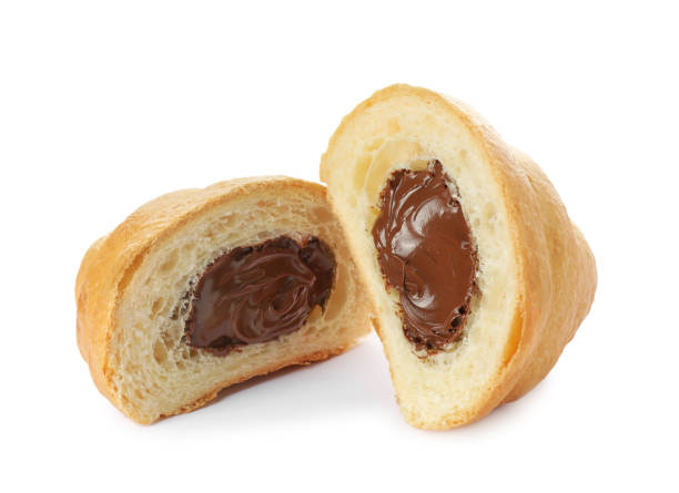 istock Delicious cut croissant with chocolate isolated on white 1835772463
