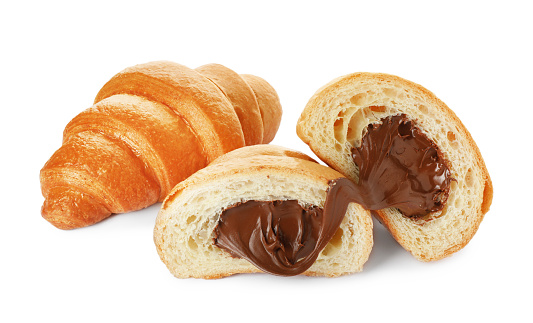 Delicious fresh croissants with chocolate isolated on white
