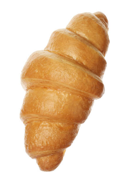 One delicious fresh croissant isolated on white