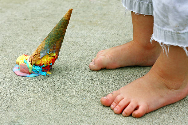 Dropped Ice Cream Cone by Feet