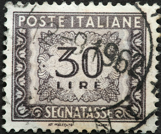 istock old 30 lire Italian postage stamp 183578964