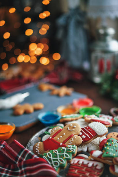 istock Decorating Gingerbread Christmas Cookies with Icing 1835789687