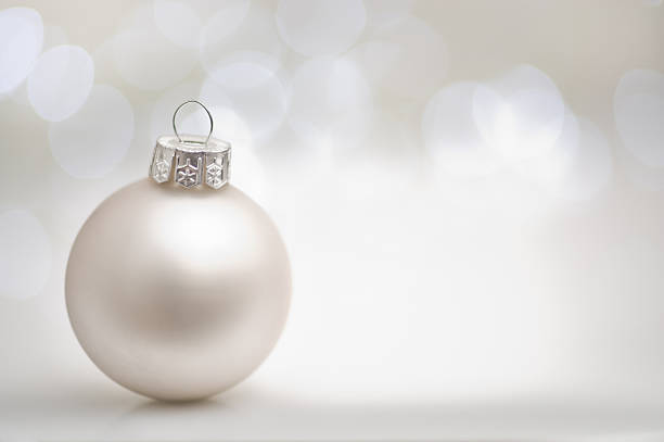 istock Silver christmas bauble with bokeh background. 183579056