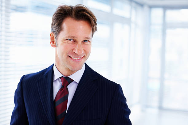 istock Attractive businessman smiling 183579374