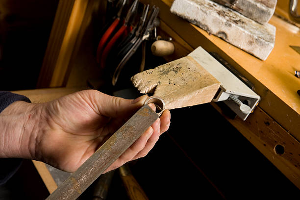 istock Jeweller filing a ring 183579524