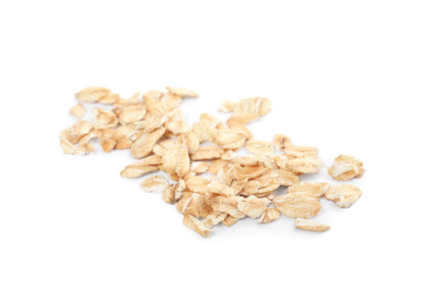 istock Pile of rolled oats isolated on white 1835797398