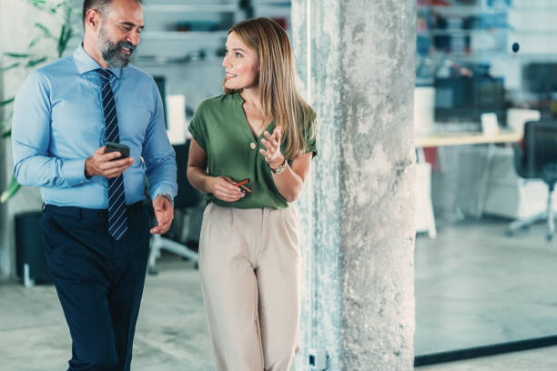 istock Business colleagues talking in the office 1835799035