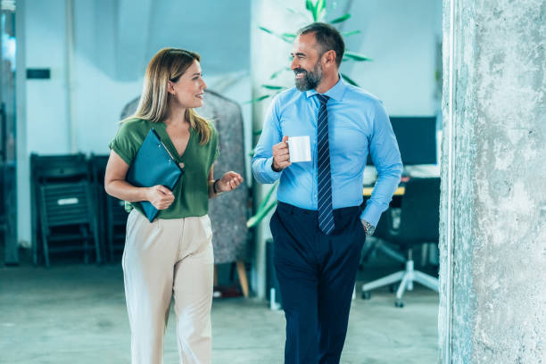 istock Business colleagues talking in the office 1835799040