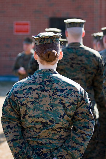 istock Female marine in uniform standing in formation 183580809