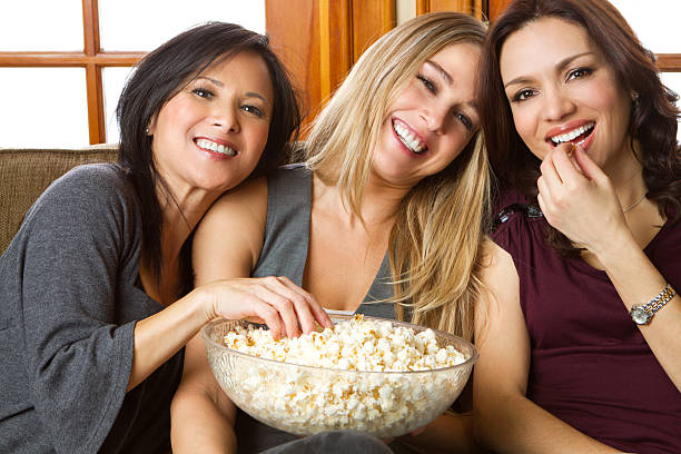 istock Diverse group of friends eating popcorn 183581848