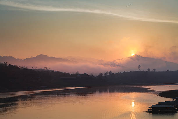 Sunrise over a Lake in the West of Thailand stock photo