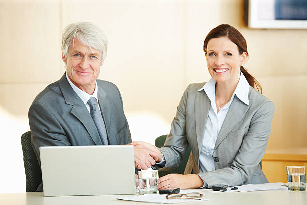 istock Handshaking on a deal 183582426