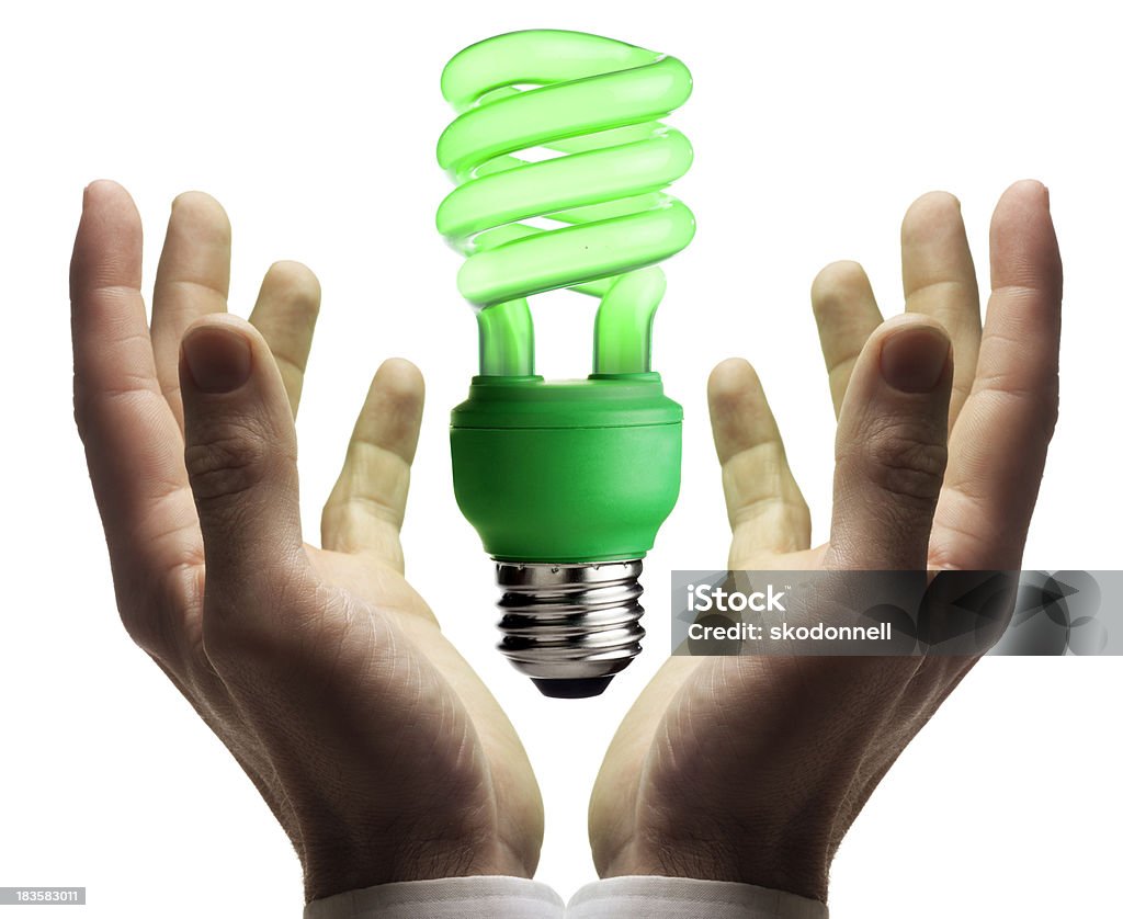 Alternative Energy Lightbulb Floating Above the Hands This is a photo of a green alternative energy lightbulb floating above two hands against a pure white background.Click on the links below to view lightboxes. Adult Stock Photo