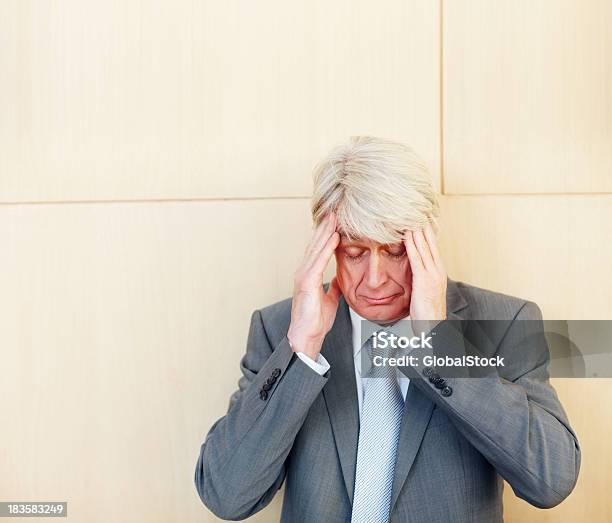 Tensed Elderly Businessman Stock Photo - Download Image Now - 50-59 Years, Adult, Adults Only