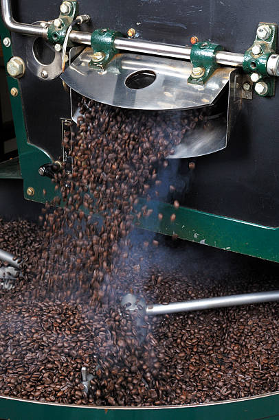 istock Freshly Roasted Coffee Beans Dropping from Hopper 183583512