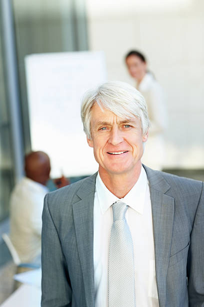 istock Senior business man looking satisfied 183583601