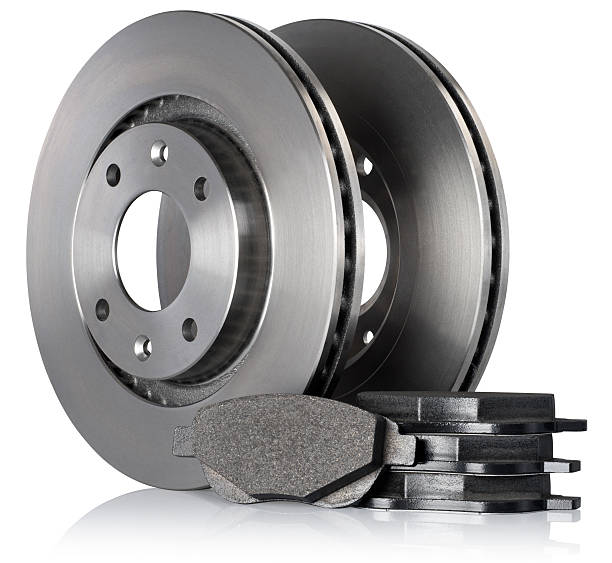 Brake Discs and Pads "Brake pads and brake discs, with clipping path." brake disc photos stock pictures, royalty-free photos & images