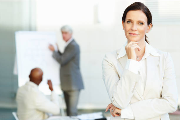 istock Confident business woman smiling 183584055