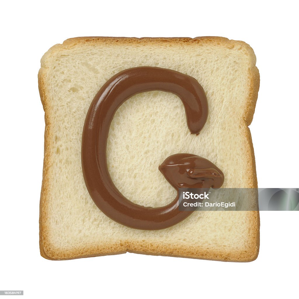 Cioccolato G lettera su tinloaf, sfondo bianco di scansione - Foto stock royalty-free di Alfabeto