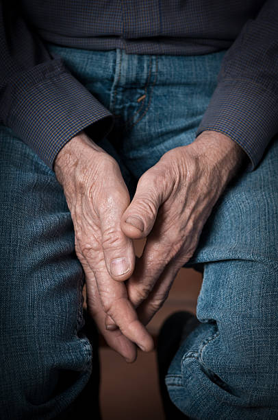 istock relaxed and strong senior man hands 183584363