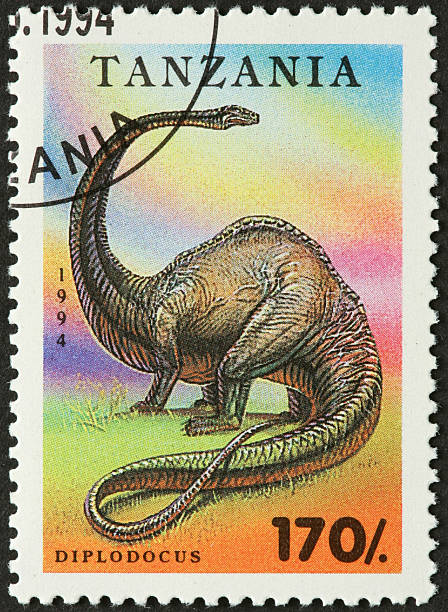 istock diplodocus dinosaur on a postage stamp 183584459