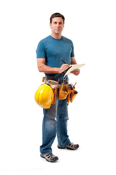 建設作業員をクリップボードに作成 - construction worker building contractor craftsperson full length ストックフォトと画像