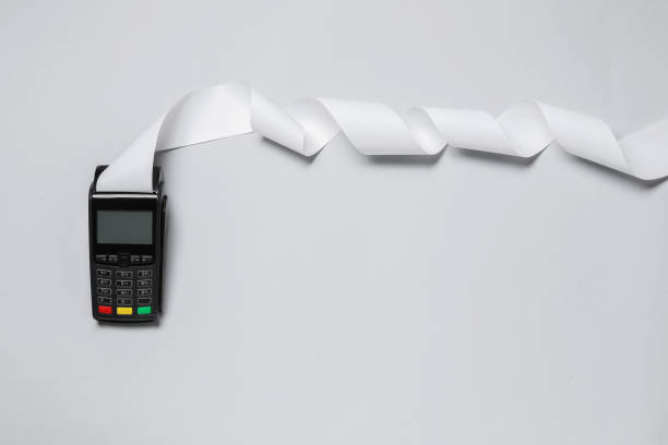 istock Payment terminal with thermal paper for receipt on light grey background, top view. Space for text 1835868171