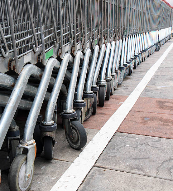 istock Many stainless trolleys in row 183587442