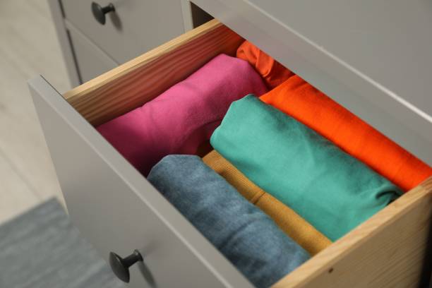 istock Different rolled shirts in drawer indoors. Organizing clothes 1835885290