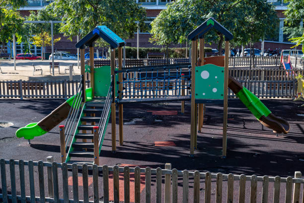 istock Fenced playground without people in the city 1835903475