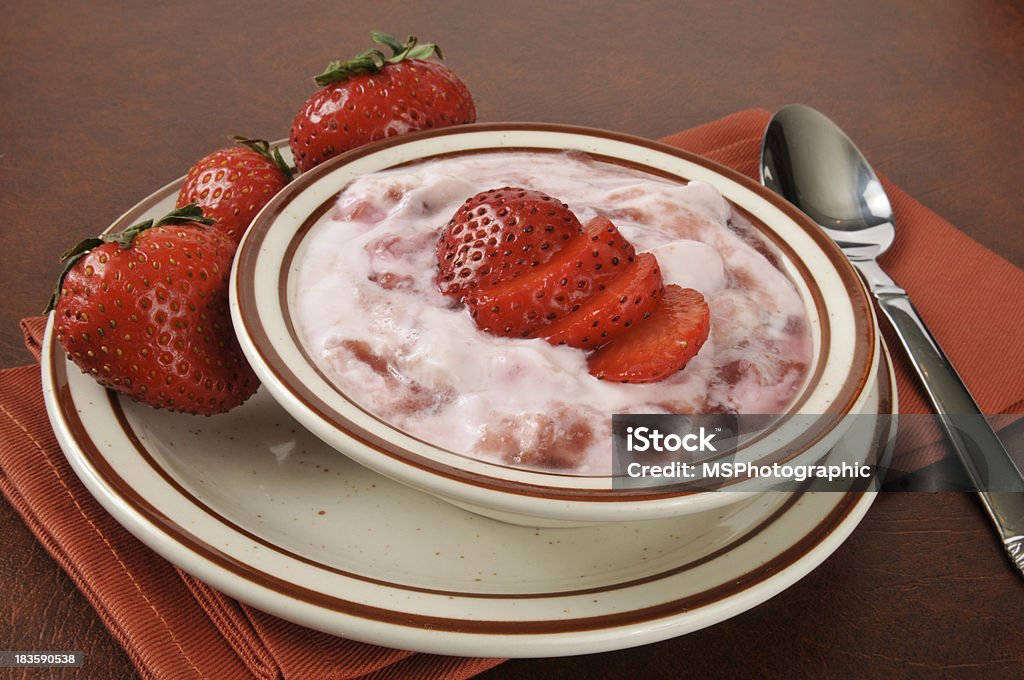 Greek yogurt with strawberry topping Healthy Greek yogurt with fresh strawberry topping Berry Fruit Stock Photo