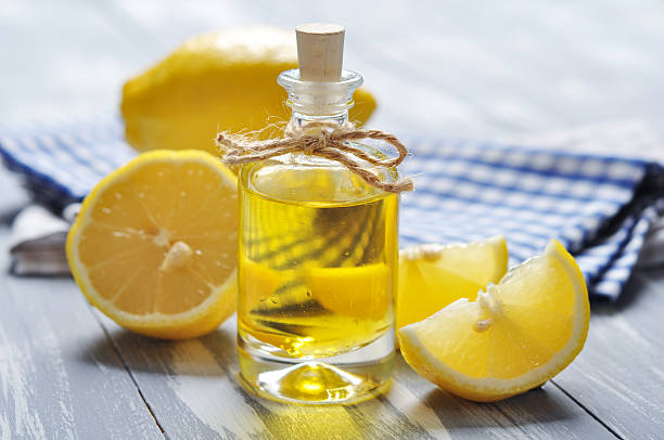 istock lemon oil in a glass bottle 183591002