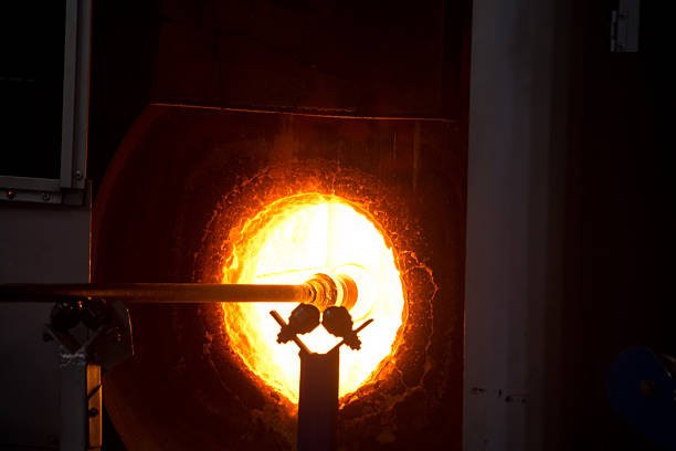 istock Blowing glass in blast furnace 183593475