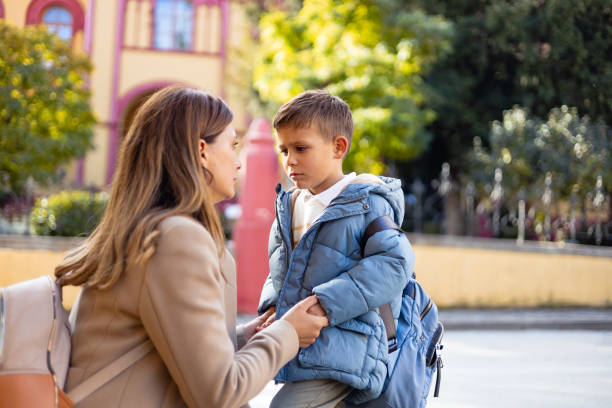 istock Mother's support on son's inaugural day at school 1835937348