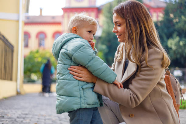 istock Mother holds her little son with care 1835938899