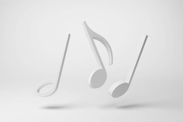 istock White musical notes floating in mid air on white background in monochrome and minimalism. Illustration of the concept of music 1835939954