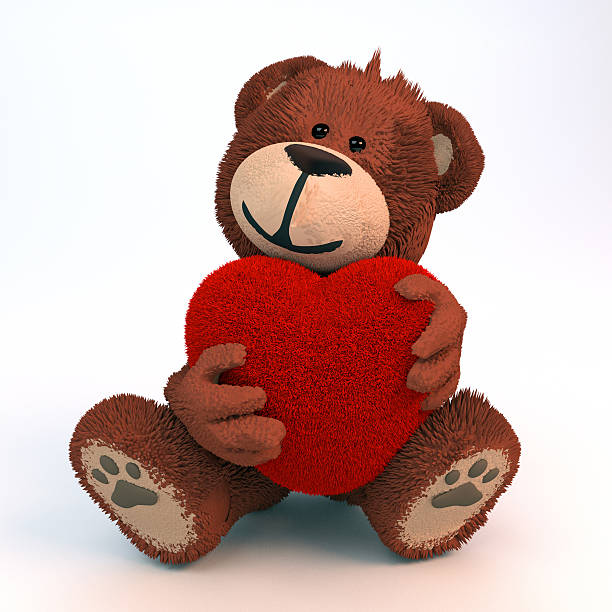 istock Teddy bear embraces plush heart 183594360