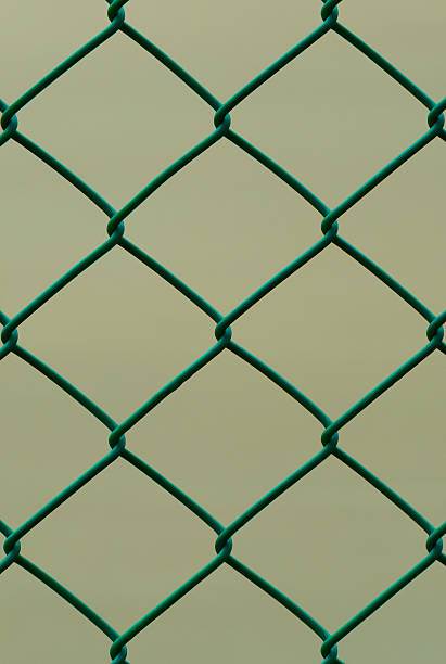 istock Green Wire Fence isolated on Brown Background, Vertical pattern 183594636