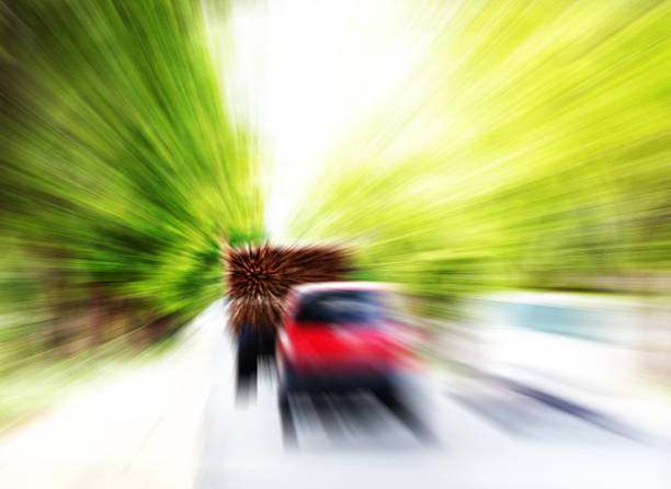 vehicles or automobiles moving at high speed on a highway stock photo
