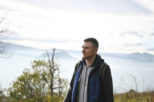 istock portrait of a hiker man exploring nature. 1835986564