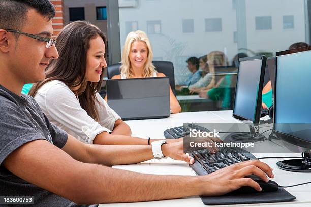 Group Of Students Training On Computers Stock Photo - Download Image Now - Computer, Classroom, University