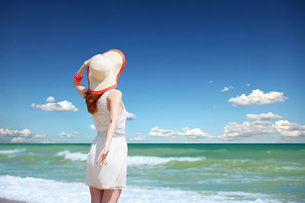 istock Redhead girl on the beack in spring time 183601410