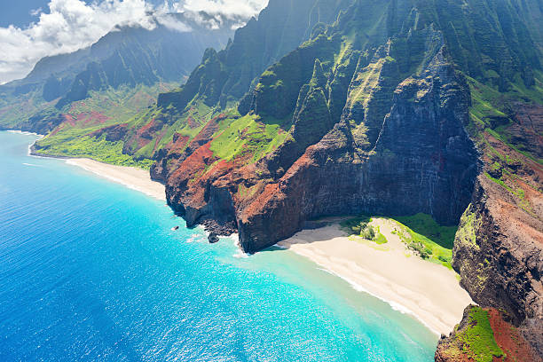 Stunning aerial view of Na Pali coast in Kauai Island View on Na Pali Coast on Kauai island on Hawaii in a sunny day kauai photos stock pictures, royalty-free photos & images