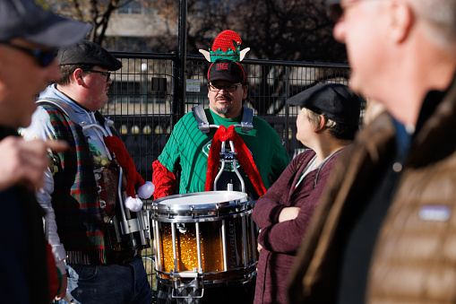 Band Guerrilla Fanfare playing while moving through the Christkindl Market in Denver, Colorado USA December 2023
