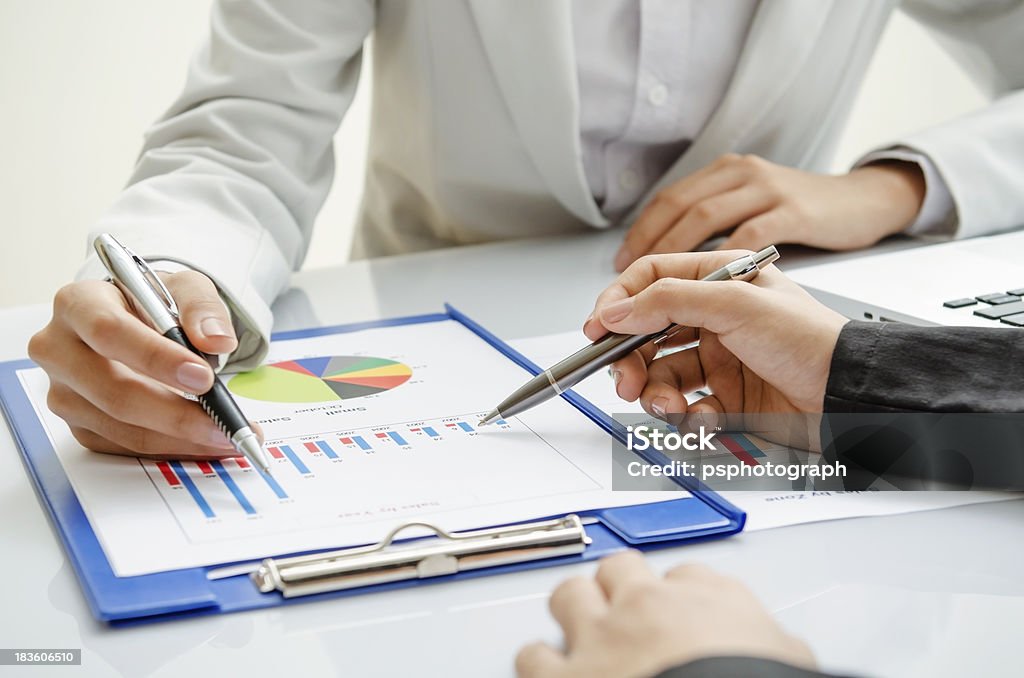 Business meeting Young business people working in office Adult Stock Photo