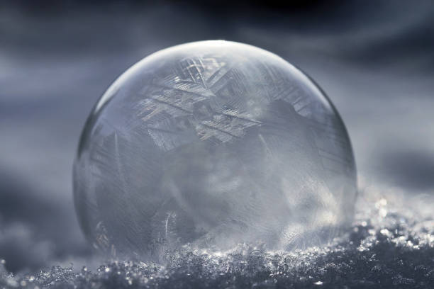 istock A frozen soap bubble with a pattern in the cold snow 1836066847